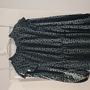 Ruffle mock neck green and black polka dot dress